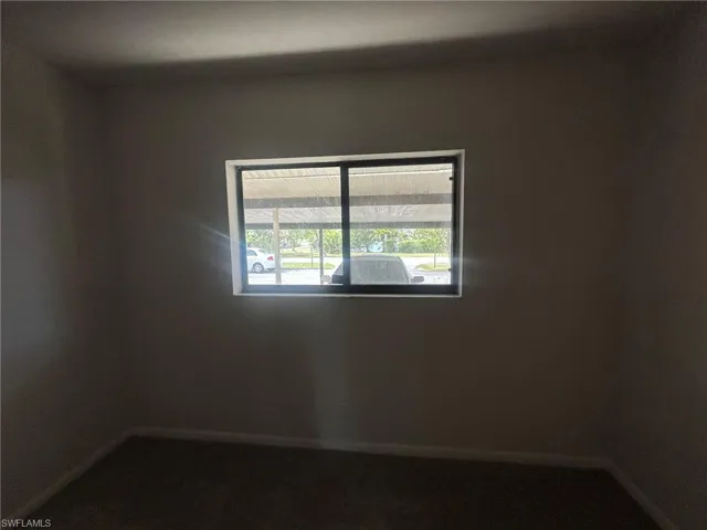 Spare room with baseboards