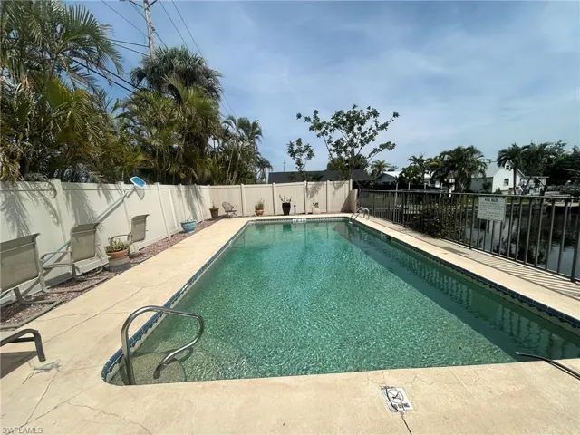 View of pool with a fenced backyard, a patio, and a fenced in pool