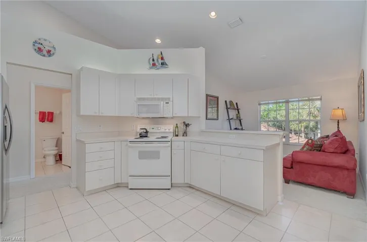 Kitchen looking towards open den