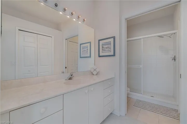 Primary bathroom with walk-in closet
