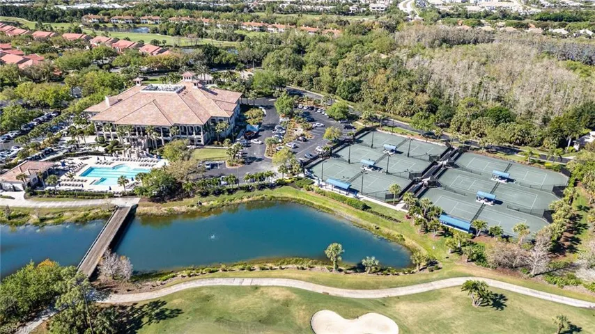 View of the Clubhouse, pool and tennis courts