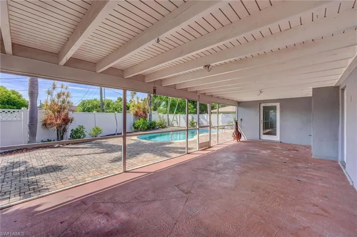 View of swimming pool featuring a patio and a fenced backyard