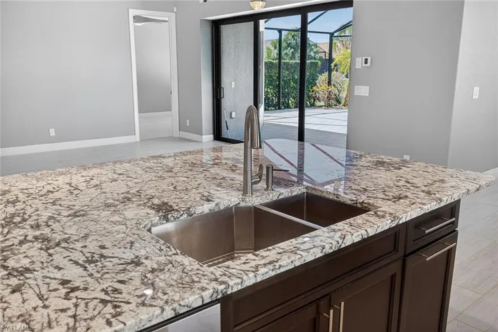 Dual stainless steel sink with disposal