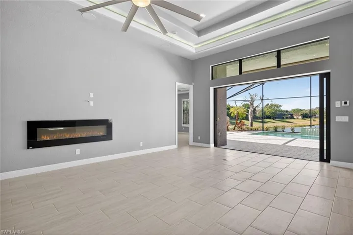Electric fireplace and TV ready wall