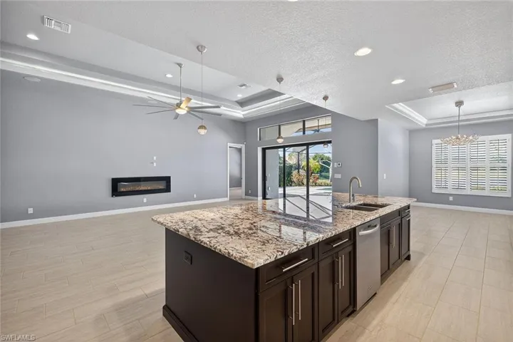 Island with sink and dishwasher and extra cabinets