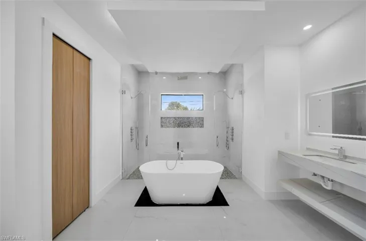 Bathroom with independent shower and bath