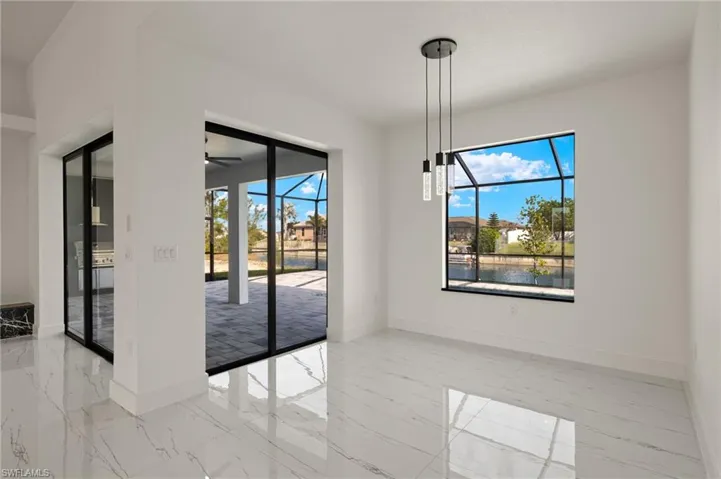 Unfurnished dining area with ceiling fan