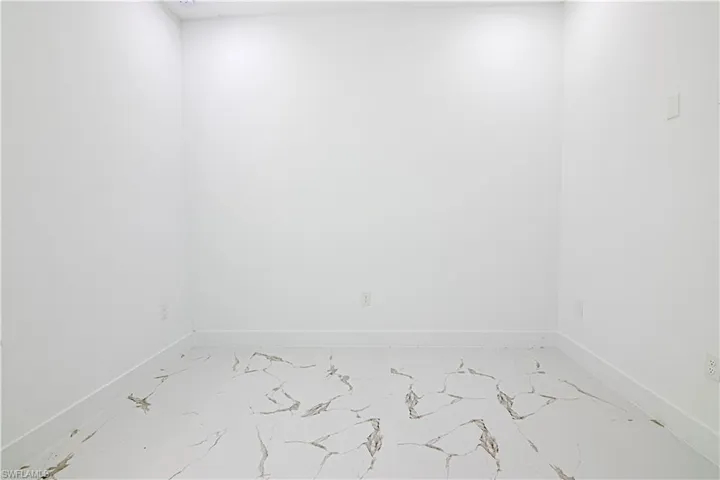 Empty room with baseboards