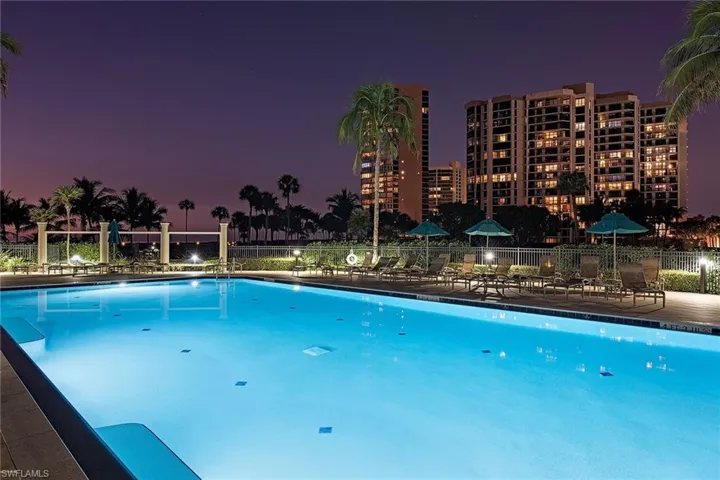 Community pool featuring a patio