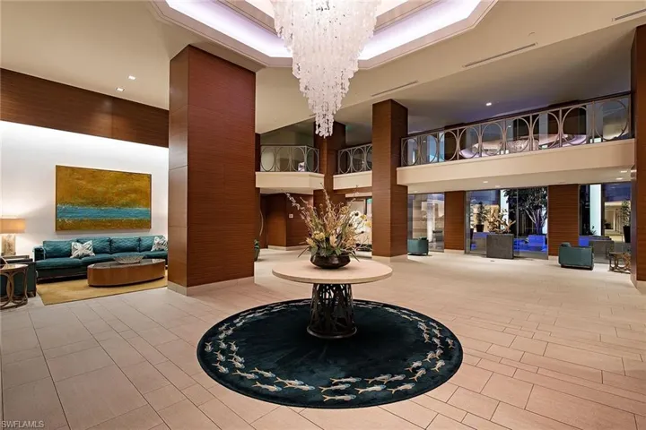 Lobby with a high ceiling and recessed lighting