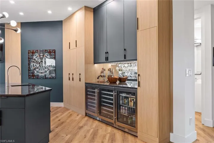Built-in bar with multiple wine/beverage coolers