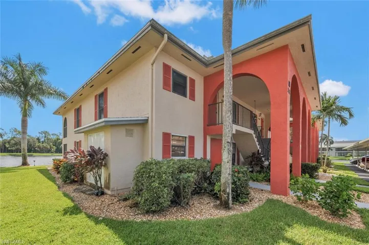 View of home's exterior with a nice well kept lawn and landscaping.