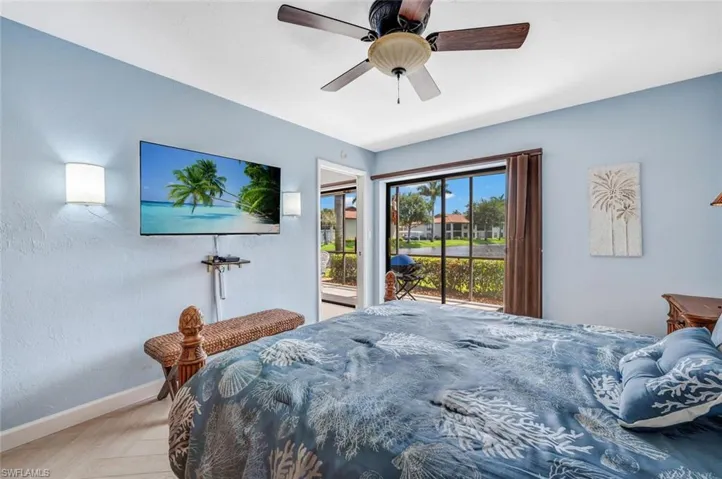 Watch tv, look out to the lake, go to lanai facing east to have your morniong coffee- featuring ceiling fan, light parquet floor and access to exterior.