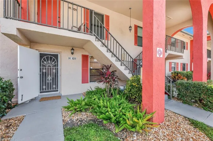 View of exterior entry with a very nice screen door.