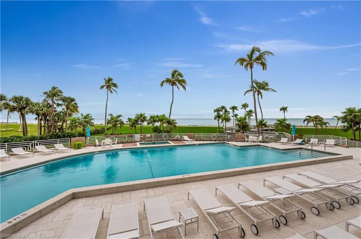Pool featuring a patio and fence