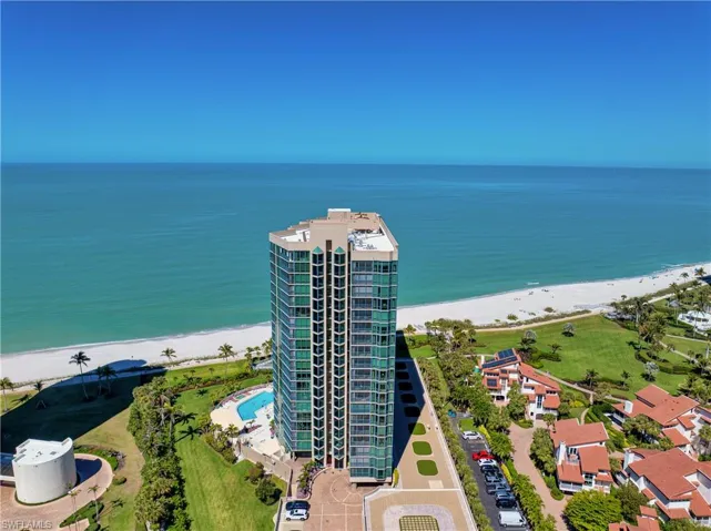 Bird's eye view featuring a water view and a view of the beach