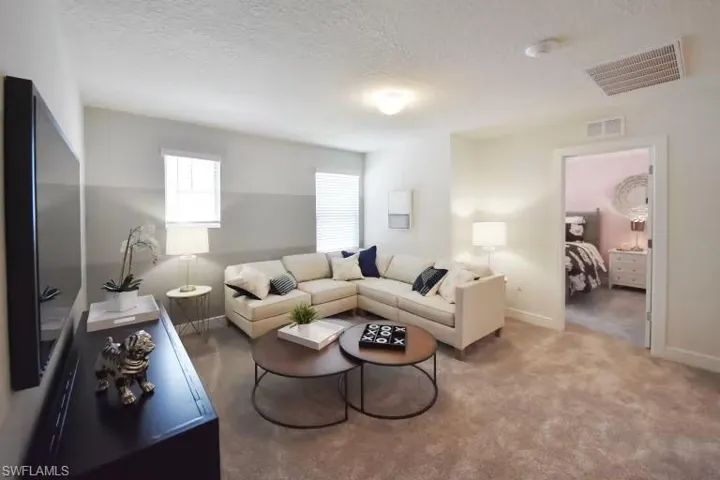 Photos are from a furnished model; actual design choices may vary
