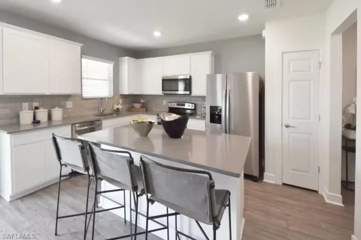 Photos are from a furnished model; actual design choices may vary