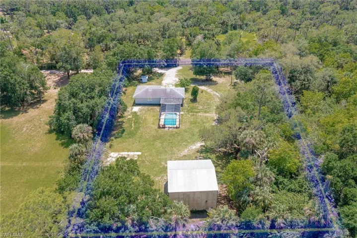 Drone / aerial view featuring a forest view