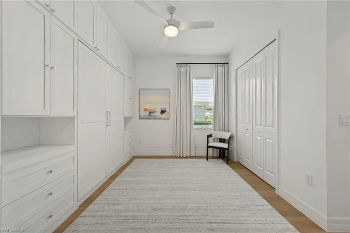4th bedroom/flex room  equipped with custom Murphy bed and built in storage