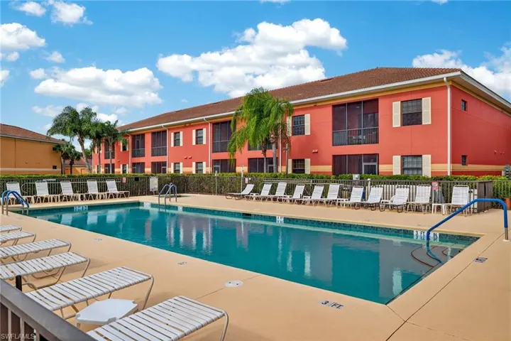 Community pool with a patio area