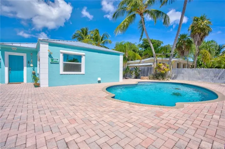 View of swimming pool with a patio area