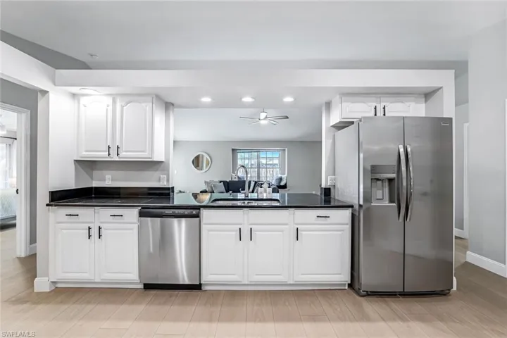Stainless steel applicances and granite countertops.