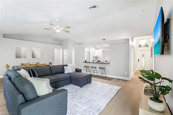 Beautiful wood laminate flooring throughout the main living area and bedrooms.