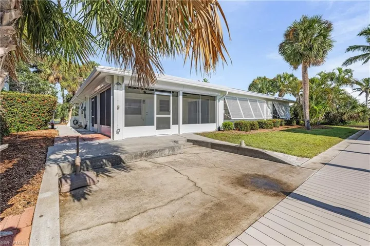 Patio area with covered boat lift