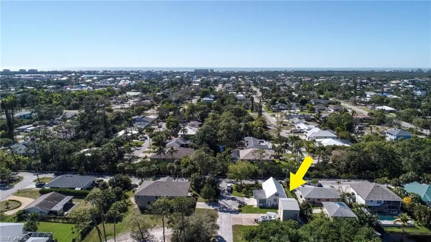 Birds eye view of property with a residential view