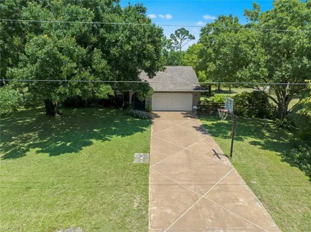 104  Wellington  AVE, Lehigh Acres, FL 33936