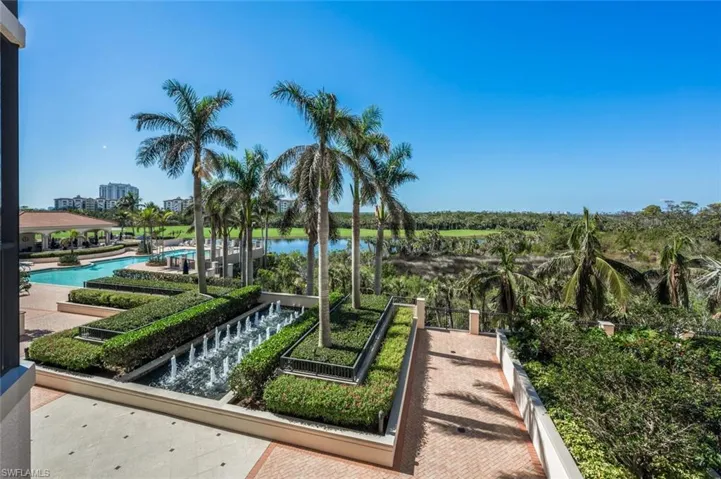 Balcony views of the golf course, lake, fountains & pool