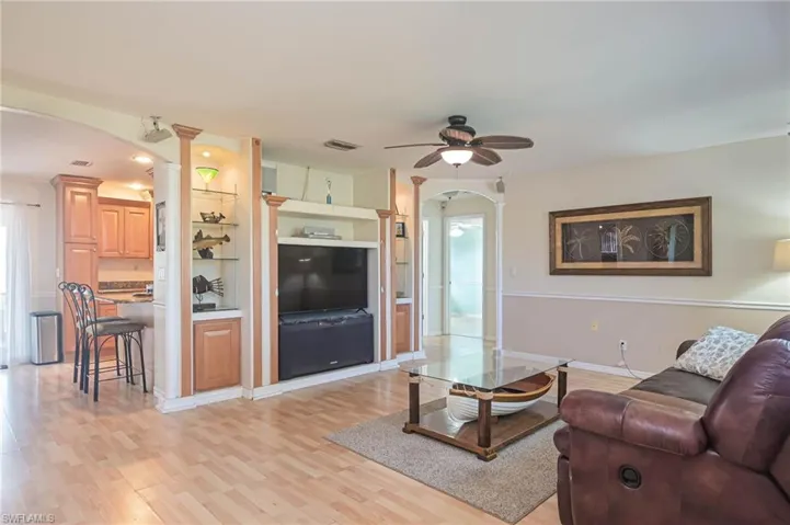 Living room featuring built-in entertainment