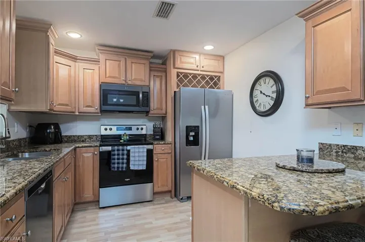 Kitchen with stainless steel appliances,granite counter tops
