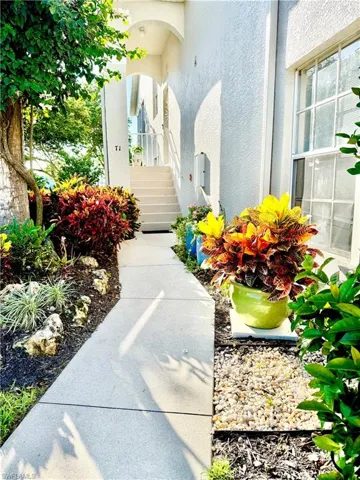 View of exterior entry with stucco siding