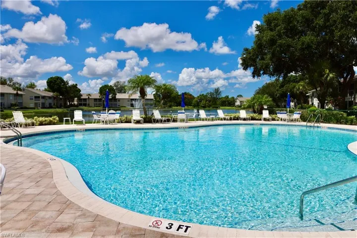 Community pool featuring a patio area