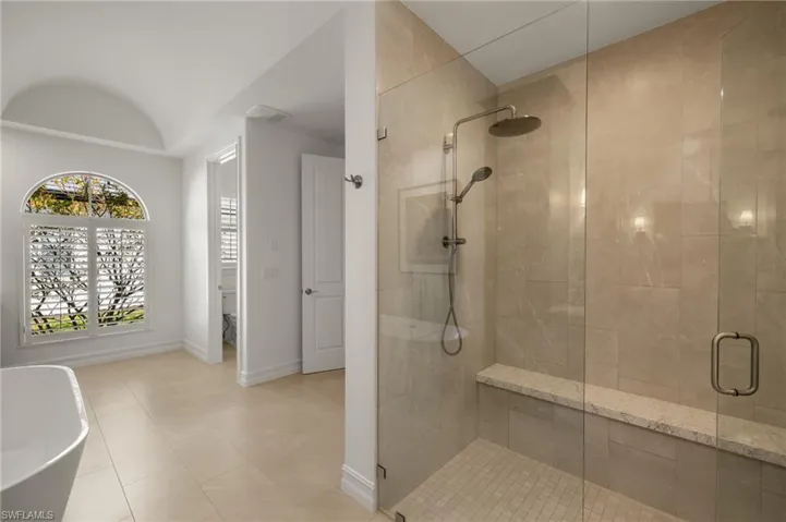 Bathroom with shower with separate bathtub