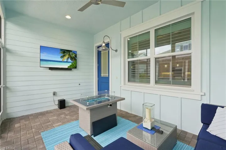 Covered patio featuring a ceiling fan, recessed lighting, and a paved flooring surface