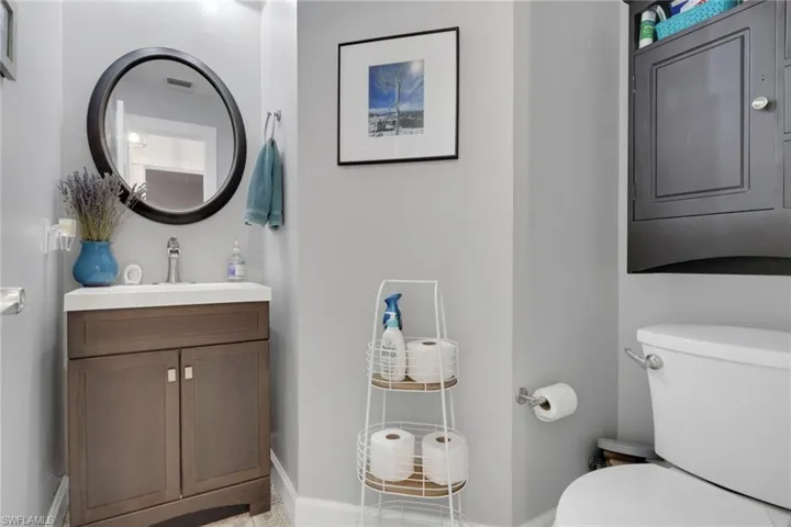 Half Bath on the first floor across from the bedroom on the first floor