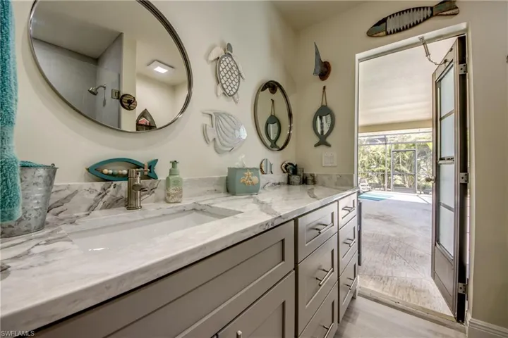 Full bathroom with a shower and vanity
