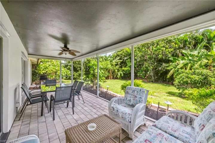 View of patio with ceiling fan