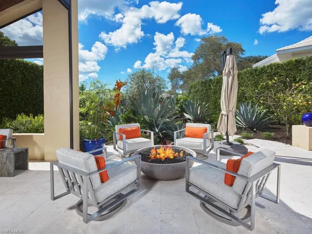 View of patio / terrace featuring an outdoor fire pit