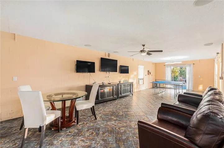 Family room on first level with slider access to pool