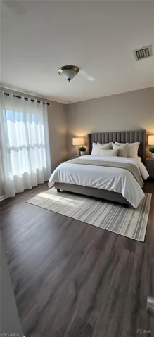 Bedroom featuring wood finished floors