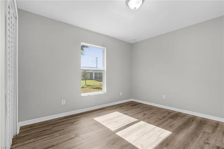 Empty room with wood finished floors