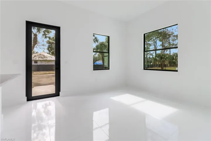 Empty room featuring tile patterned flooring