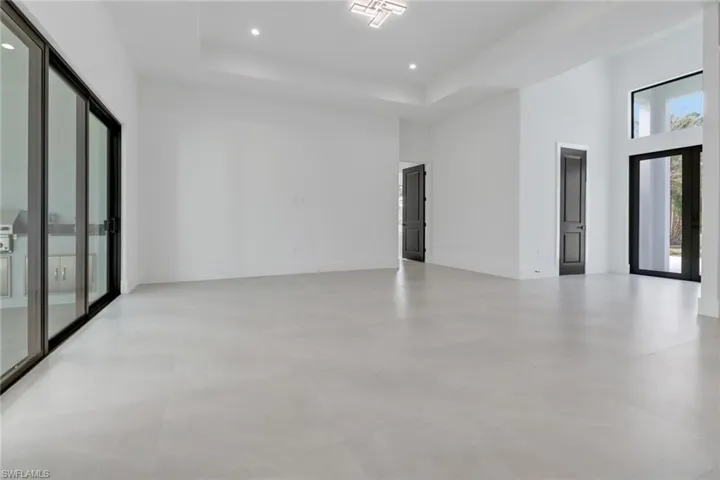 Empty room with a raised ceiling