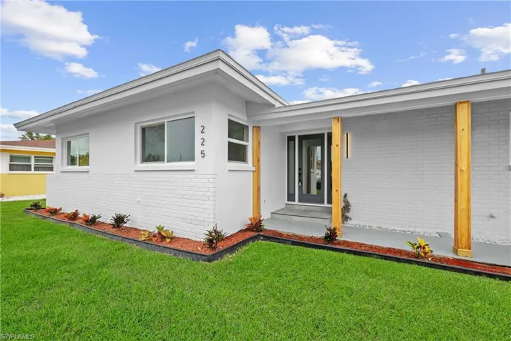 View of front of home with a front yard