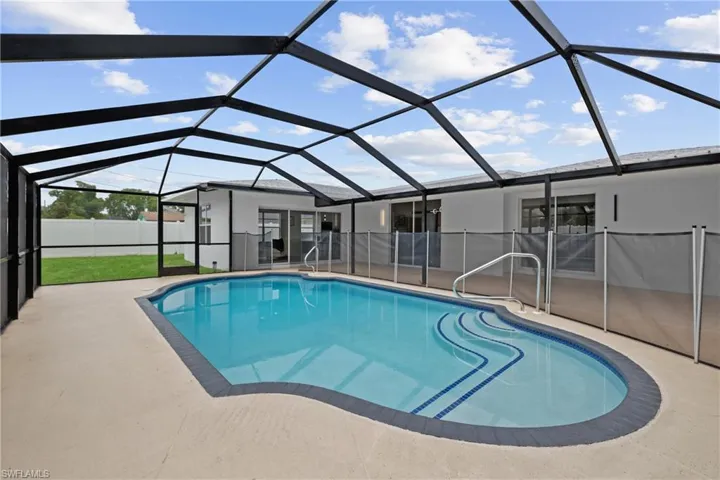 View of pool featuring a lanai and a patio area