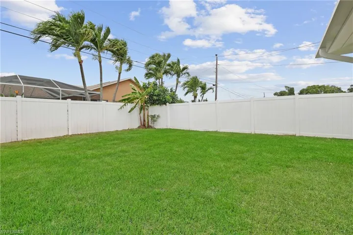 View of yard featuring a lanai